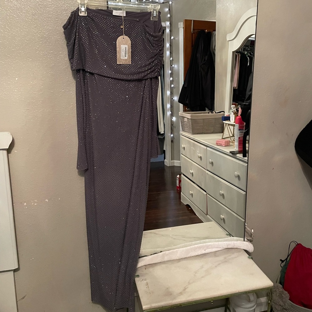 This is a meshki brand new dress with the tags